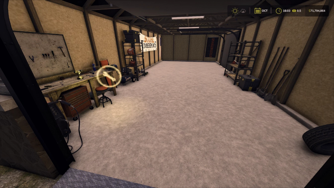 Interior of Small Garage Workshops mod in FS25, featuring tools and storage for Farming Simulator 25.