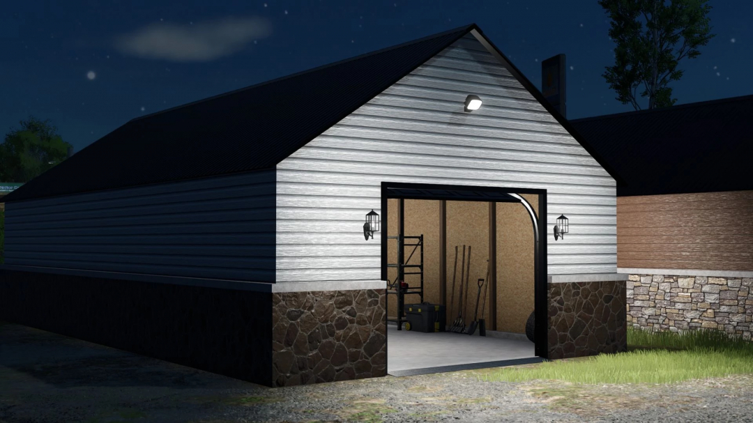 Nighttime view of Small Garage Workshops mod for FS25 with open door showing tools inside.