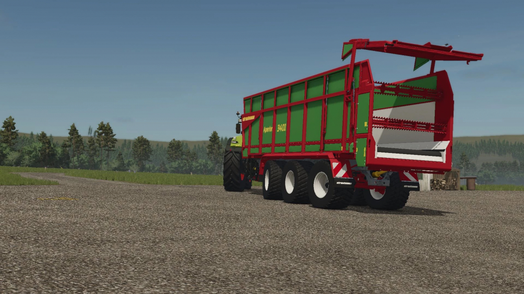 Strautman Aperion 7300 trailer mod in FS25 standing on a gravel path with forest background.