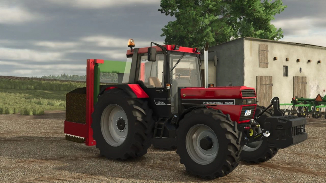 FS25 mod Strautmann Hydrofox v1.0.0.0 shows a red tractor with trailer on a farm, enhancing Farming Simulator 25 gameplay.