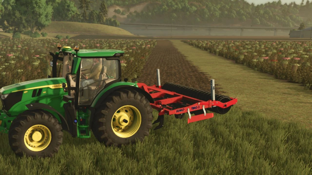 FS25 mod Sumo Trio 3 v1.0.0.0 in action, attached to a green tractor preparing a field.