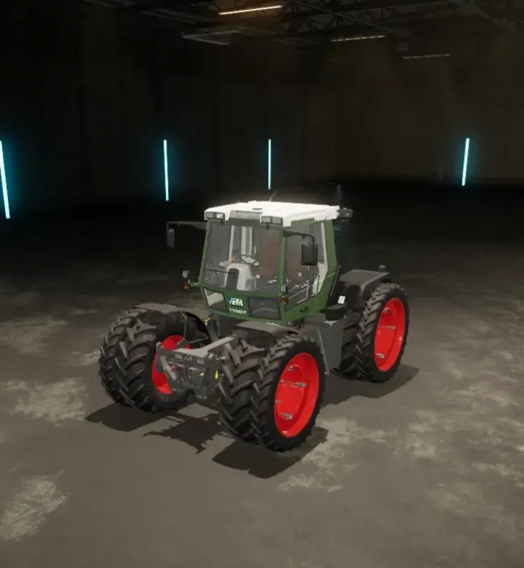 FS25 mod: Fendt Xylon tractor with tire configurations in a dimly lit warehouse.