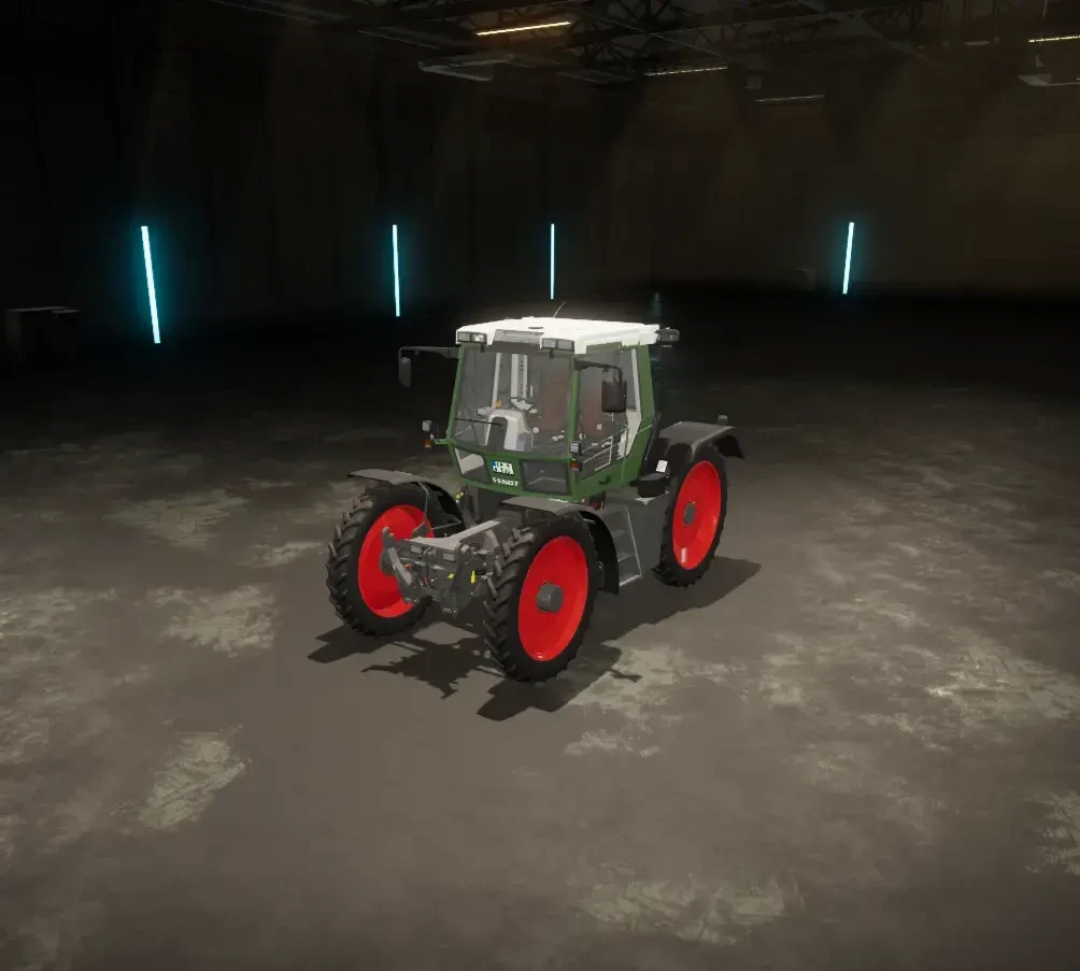 FS25 mod showcasing Fendt Xylon with tire configurations in a dimly lit garage.