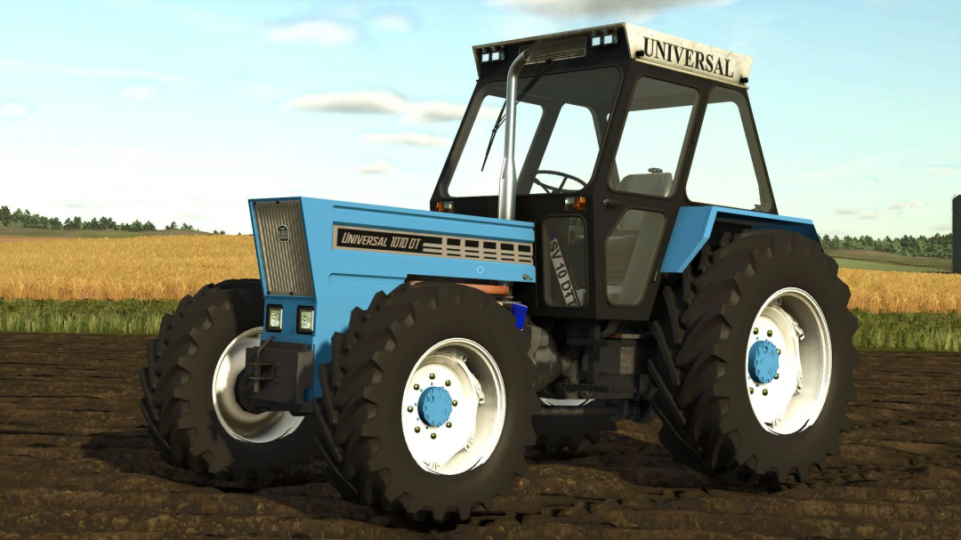 Universal 1010DT tractor mod in FS25, featuring blue body and large tires in a field.