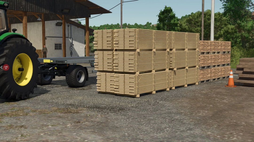 FS25 mods showcase Universal Autoload. Stacks of lumber beside a trailer near a shed in Farming Simulator 25.