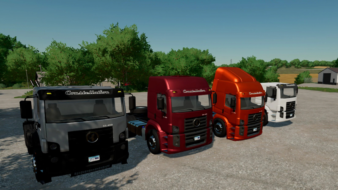 FS22 mods VW Constellation trucks in various colors parked on a farm.