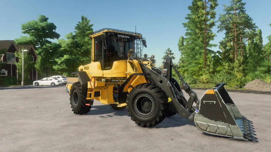 Volvo L60Fbr Loader mod in FS22, displayed on a forested landscape.