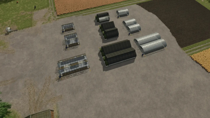 fs25-mods, Various greenhouses from the Greenhouses Plus Pack mod in Farming Simulator 25, displayed on a farm plot.