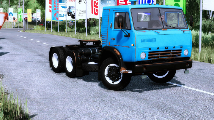 fs22-mods,  Kamaz 54112 semi mod in FS22 game, featuring a vintage blue truck on a rural road.