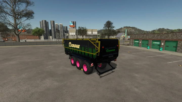 fs25-mods, FS25 mod Krone GX520 by DraxMods v1.0.0.0 showcasing a trailer with bright pink wheels in an industrial yard.