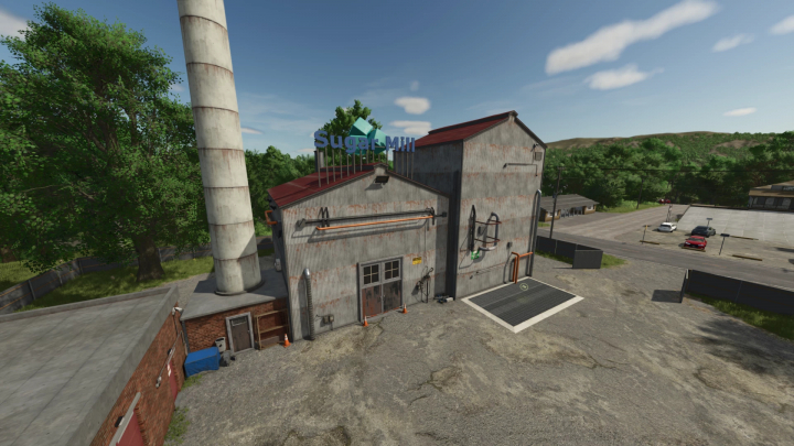 fs25-mods,  FS25 mod Riverbend Springs Edit V1.1.0.0 featuring a detailed sugar mill building with tall chimney.