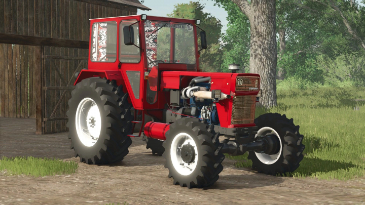 fs25-mods,  Red UTB 651 MDT tractor mod in FS25, parked near a wooden barn in a grassy field.