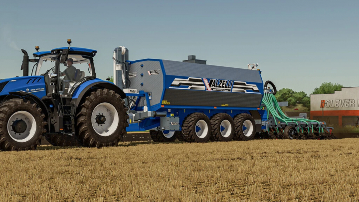 fs22-mods, FS22 mod Valzelli Cubex v2.0.0.0 attached to a blue tractor, cultivating a field in Farming Simulator 22.