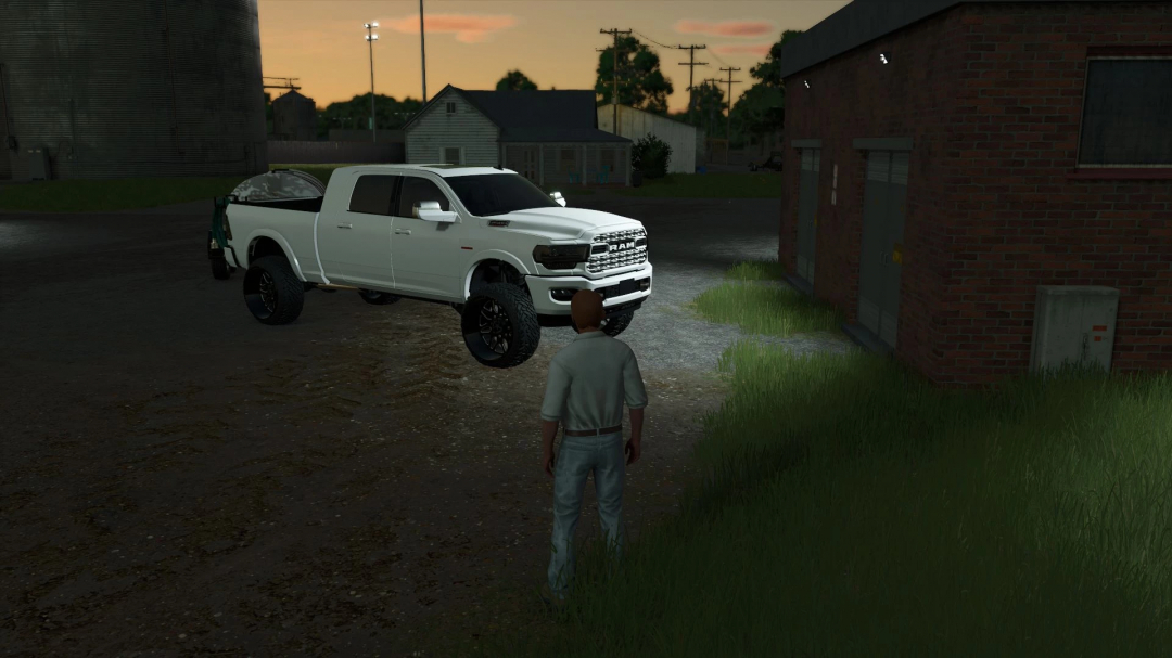 In FS25, a player stands near a white 2024 Dodge Ram 2500 Mega Cab mod v1.1.1.1, with a sunset backdrop.