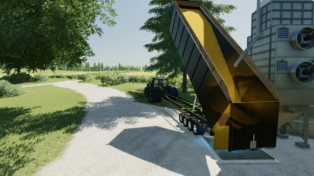 FS22 mod image showing a farming simulator tractor unloading a large flatbed trailer filled with grain.