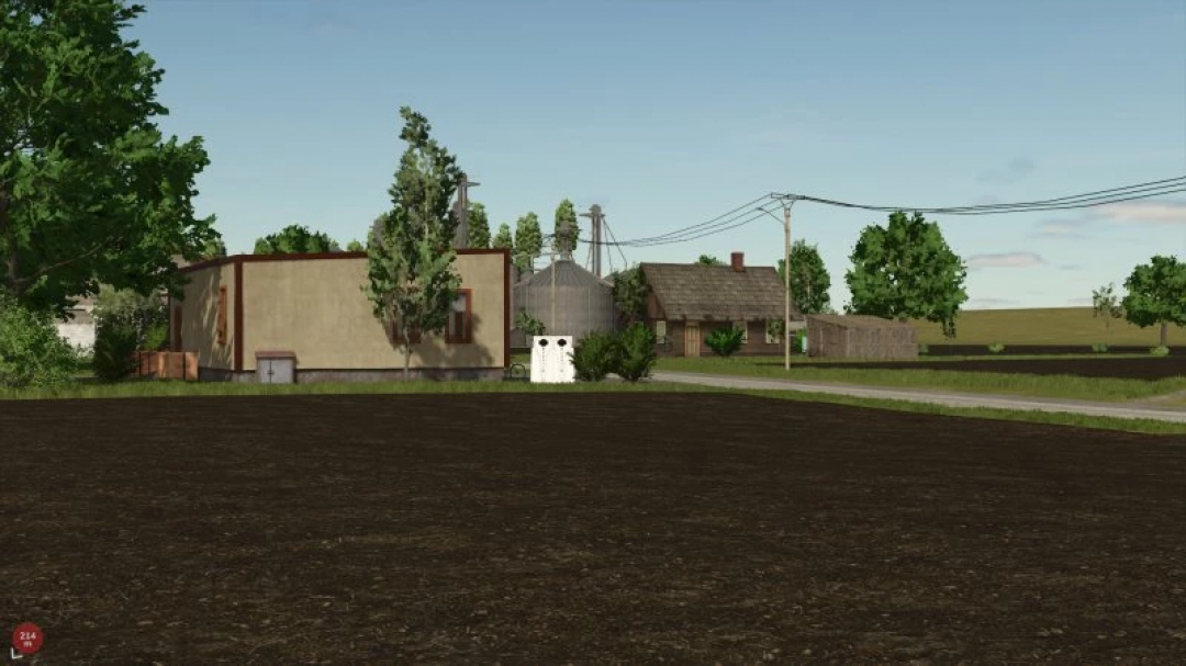 Farming Simulator 25 Bozany Map mod showing rural landscape with farm buildings and silo in FS25.