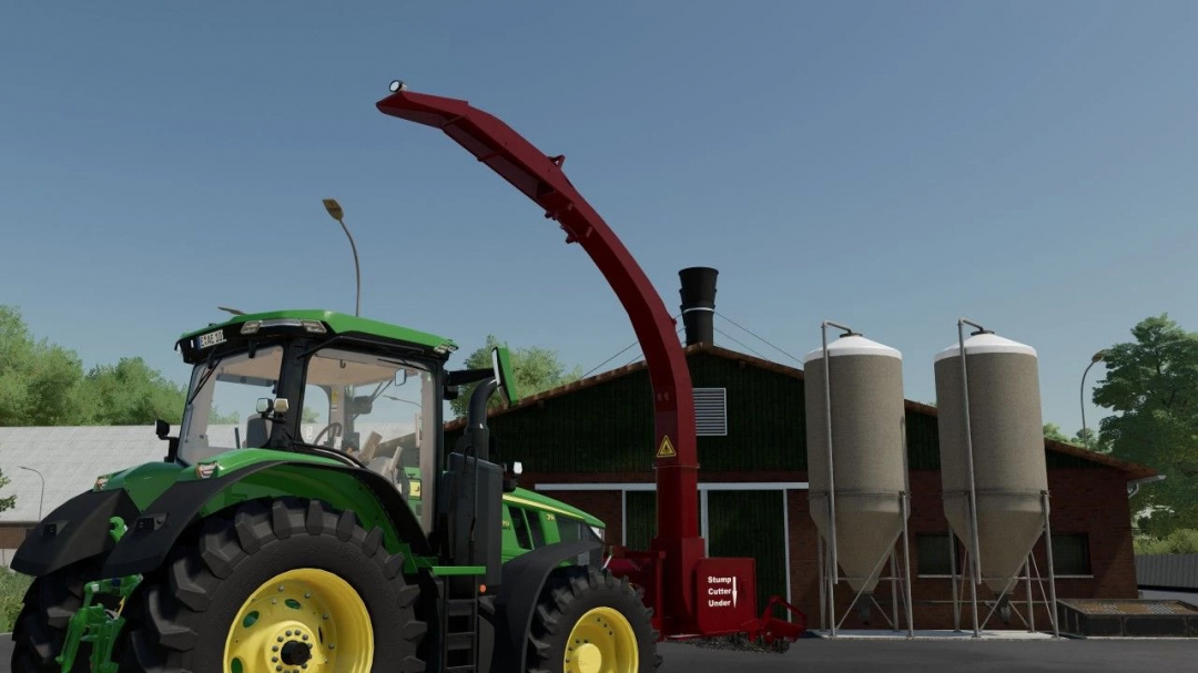 FS25 mod Bruks All In One v1.0.0.0 showing a green tractor with a red cutter near silos.