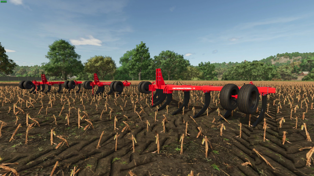 Case IH 14 mod for FS25 in a field setting, showcasing red agricultural equipment with trees in the background.