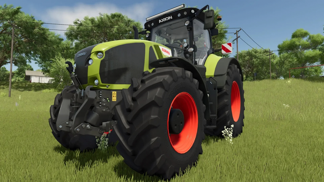 Claas Axion 900 Special tractor mod in FS25 with detailed design on a grassy field.