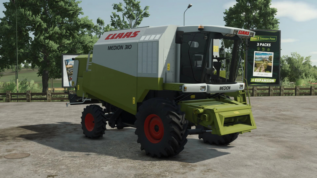 FS25 mod Claas Medion 310 combine harvester on a farm road.