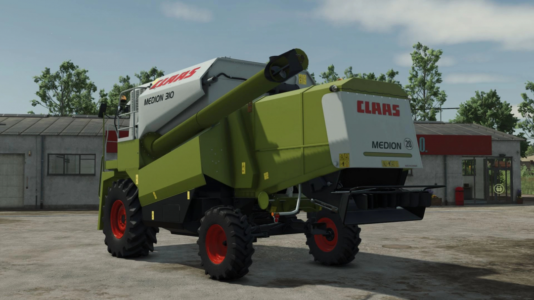 Claas Medion 310 combine harvester mod in FS25, showcasing detailed design in a farm setting.