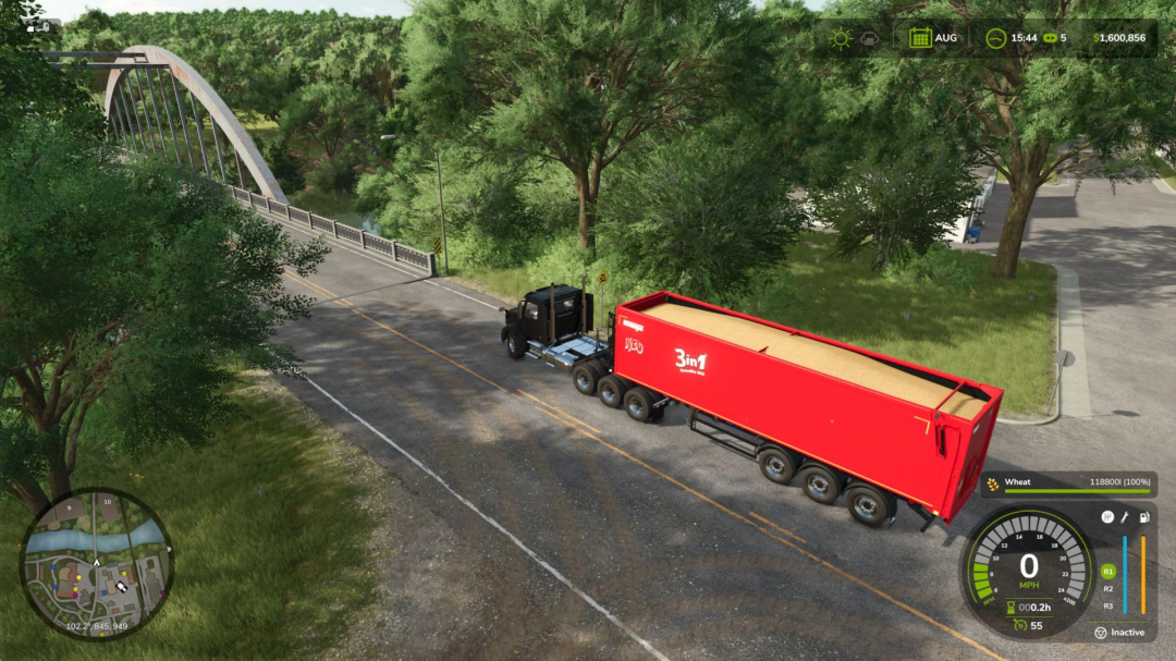 A red truck trailer loaded with grain on a road in Farming Simulator 25, showcasing the Enhanced Capacity mod.