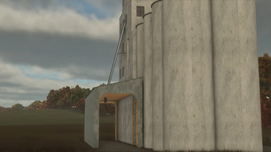 FS25 LJR COOP building mod in Farming Simulator 25, featuring a large gray silo structure on a grassy field.