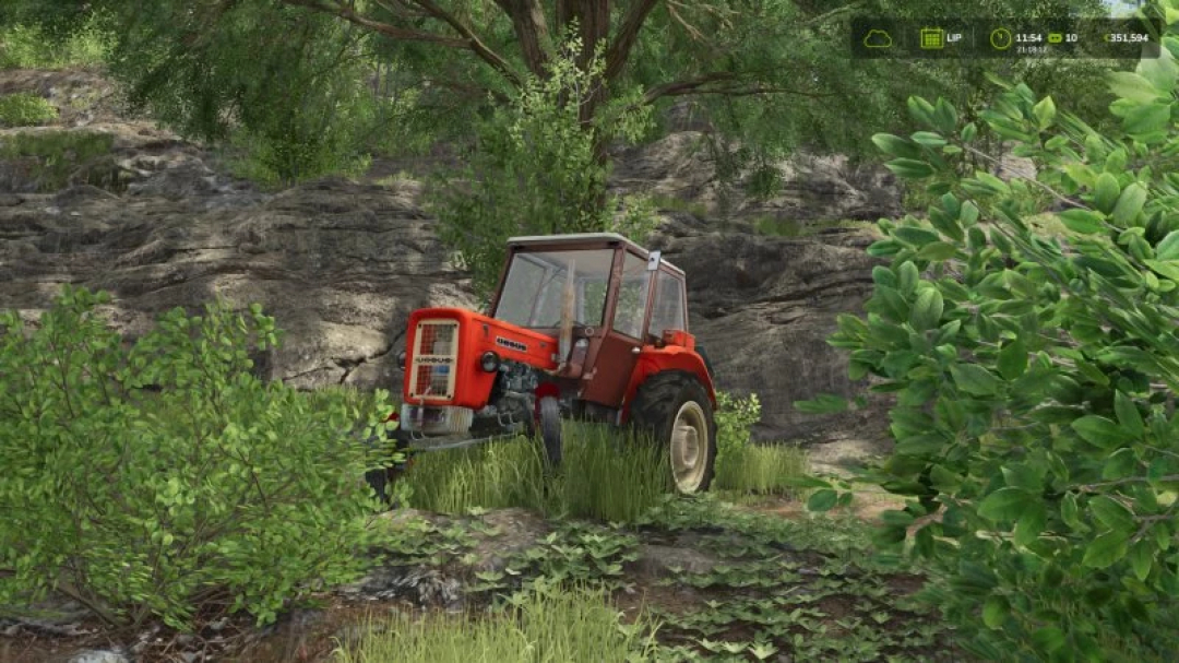 FS25 Ursus c 360 v1.0.0.0 mod in Farming Simulator 25 featuring a red tractor in a lush, rocky landscape.