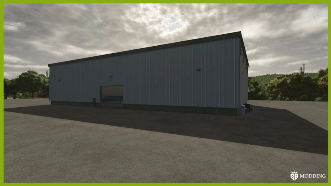 FS25 mod Farm Silo Deluxe v1.0.0.0, large metal warehouse under cloudy sky.