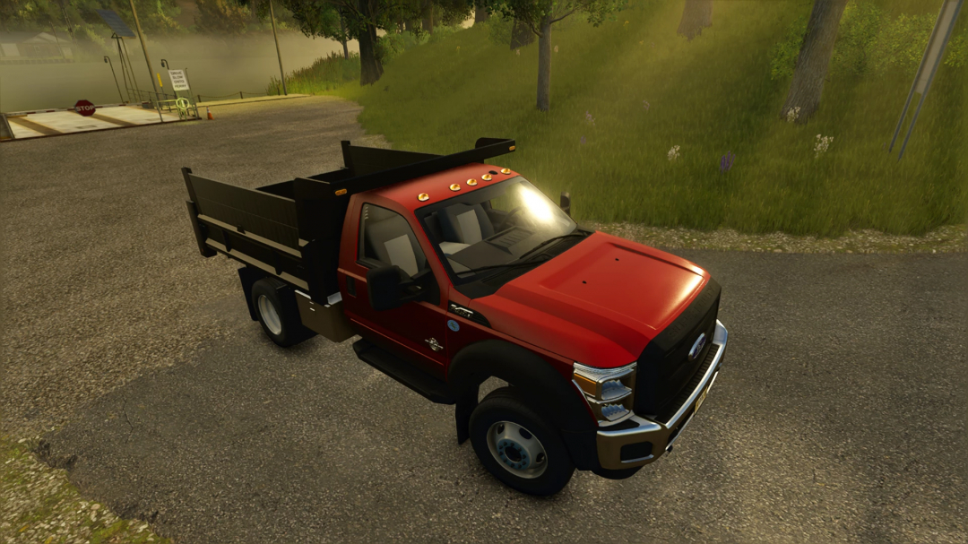 Ford F550 Dump Truck mod in Farming Simulator 25. Red truck parked on a rural road.