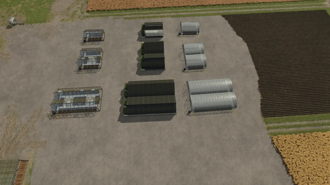 Various greenhouses in FS25 Greenhouses Plus Pack mod, arranged on a large farm area.