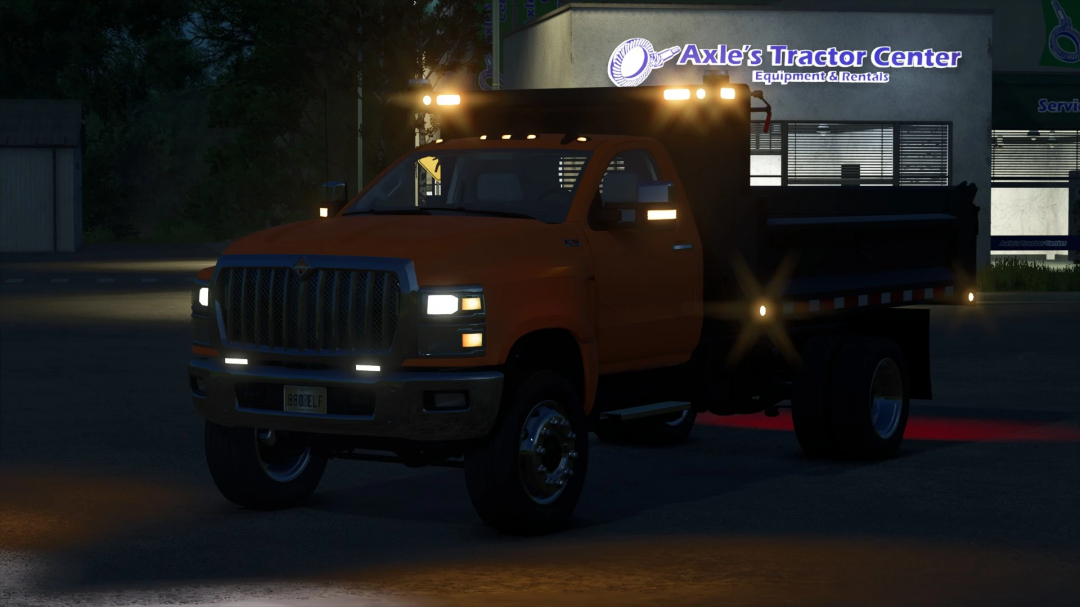 FS25 mod International CV Series Public Works at night near Axle's Tractor Center.