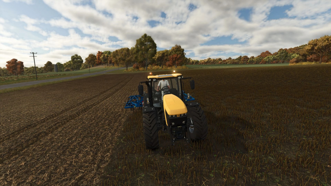 JCB Fastrac 4220 tractor plowing field in Farming Simulator 25 mod, under a partly cloudy sky.