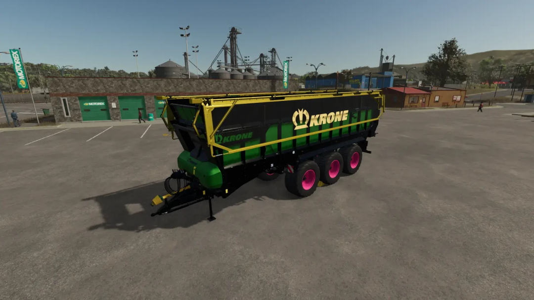 Krone GX520 trailer mod for FS25 by DraxMods, showcasing vibrant green and pink design in Farming Simulator 25.