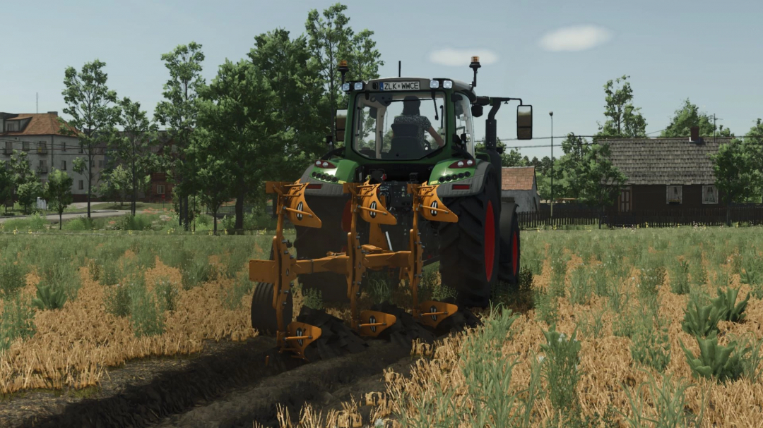 FS25 mod: Tractor using Kuhn / Huard Master 120 on a field in Farming Simulator 25.