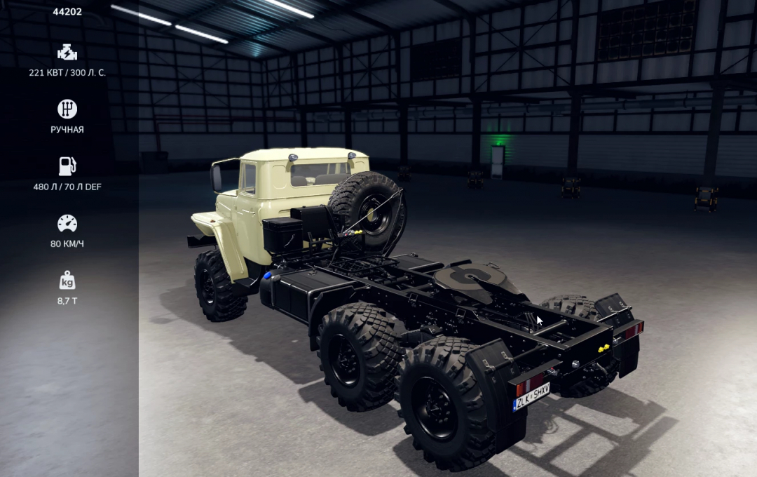 FS25 mod LIZARD 44202 showcases a robust truck with spare tire in a warehouse setting, highlighting specs like engine power and speed.