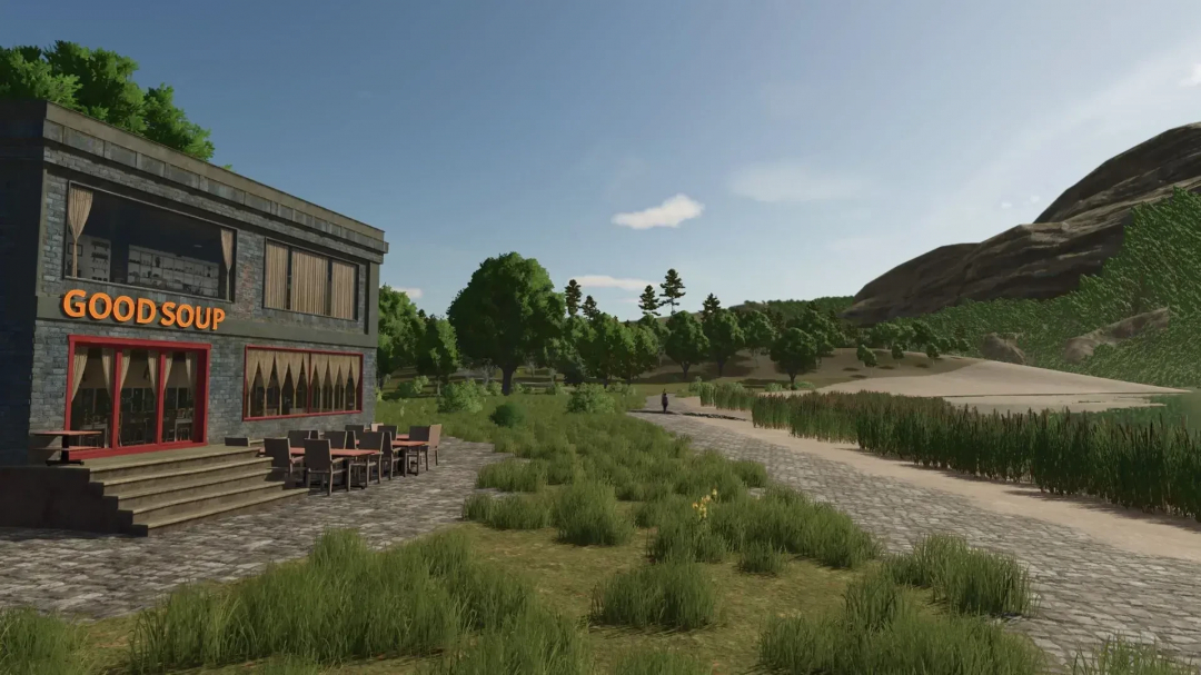 LoneHills Map v1.0.4.0 mod for FS25 features a scenic landscape with a 'Good Soup' building, lush greenery, and mountains.