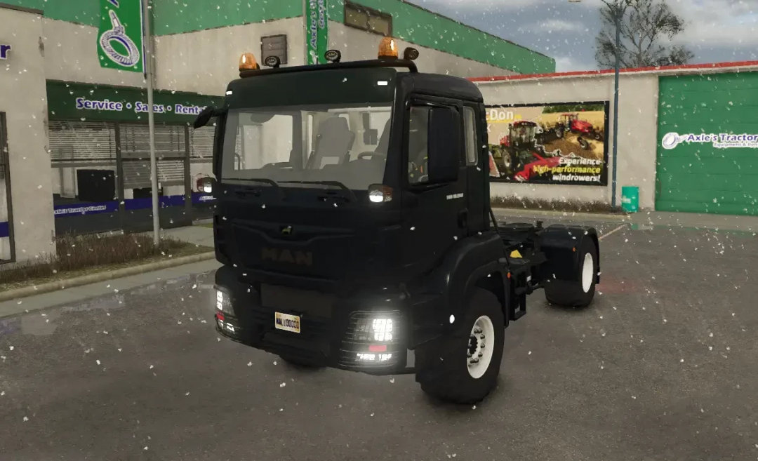 FS25 mod MAN TGS 18500 v1.0.0.3 truck in snowy environment outside a dealership.