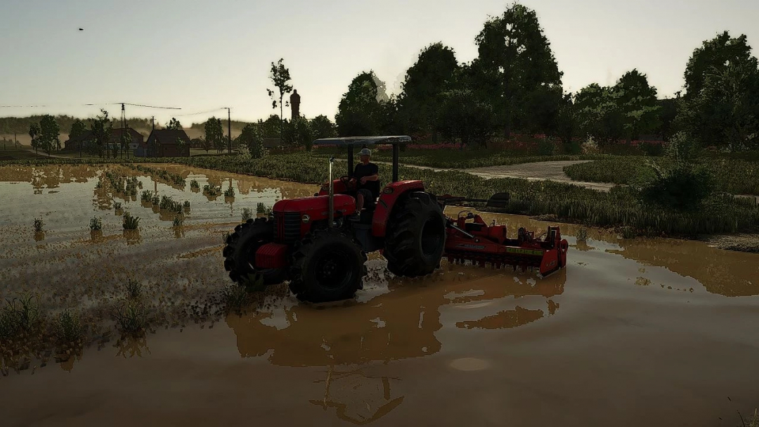 Massey Ferguson tractor in flooded field, FS25 mods.