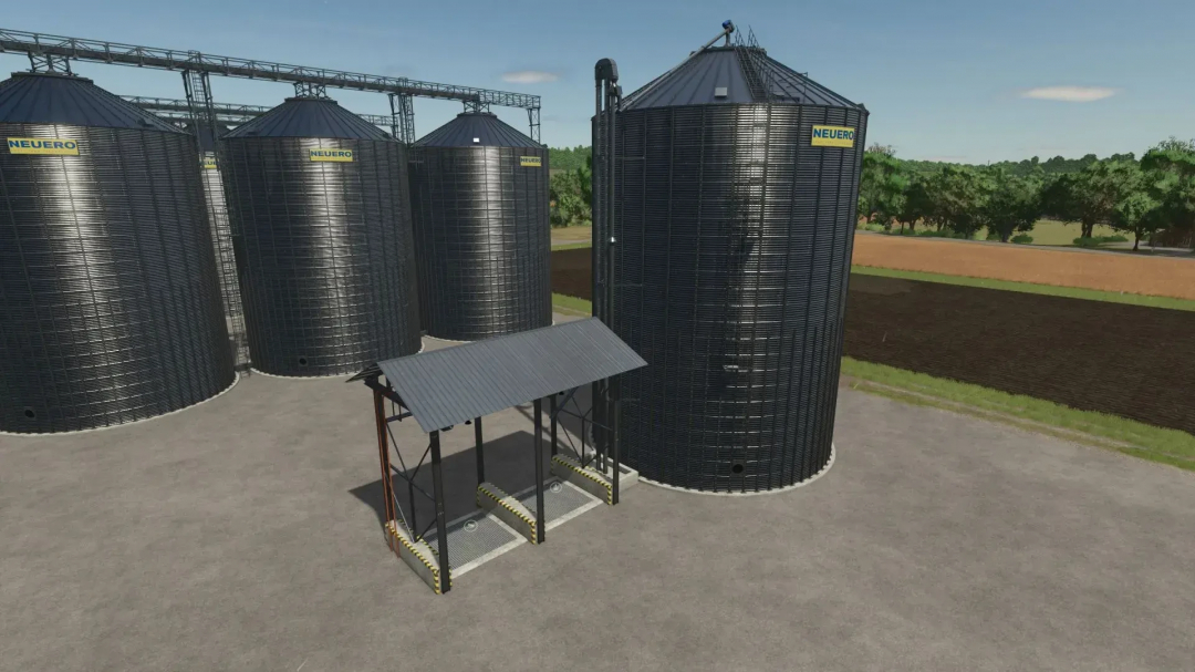 Multifruit Silos v2.0.0.0 mod for FS25 showing large metal silos and storage setup.