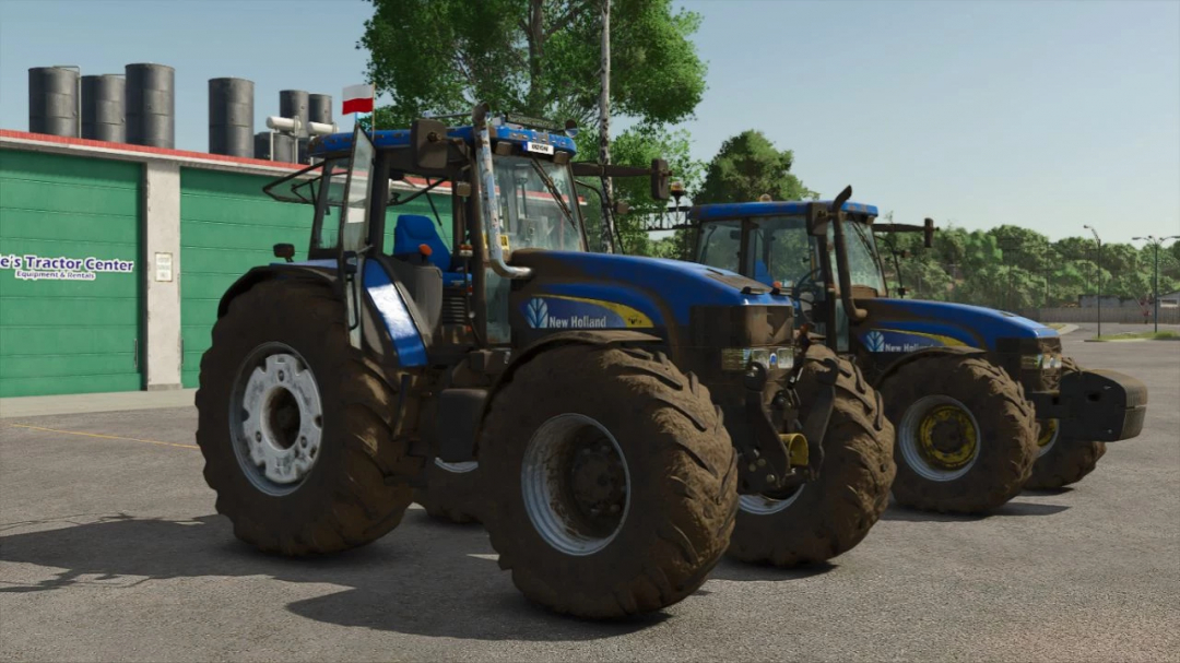 Two New Holland TM tractors in FS25 mod parked at a tractor center.