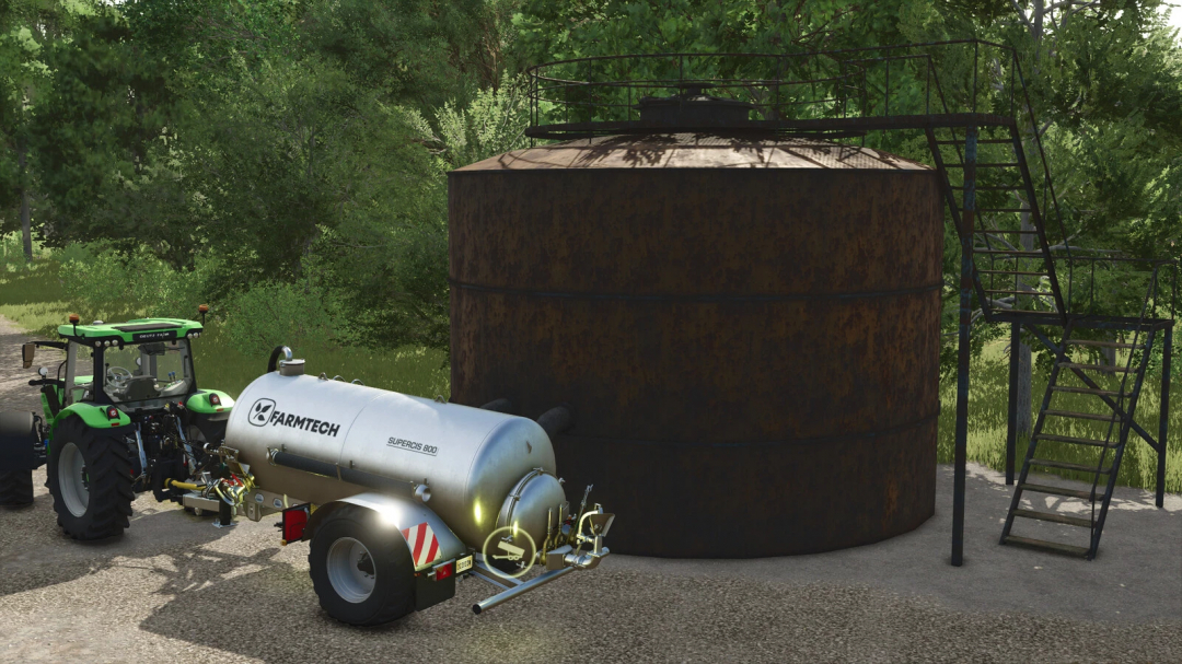 FS25 mod - Old Slurry Tank v1.0.0.0 with tractor in a forest setting.