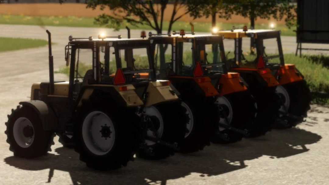 Four Renault TZ tractors mod in FS22, showcasing different colors and lighting. Farming Simulator 22 mods.