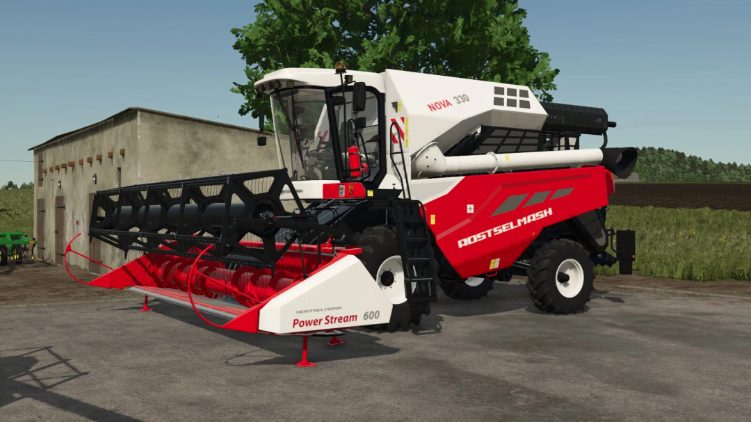 FS25 mod 'Rostselmash Nova 330 v1.0.0.1' combine harvester parked near building.