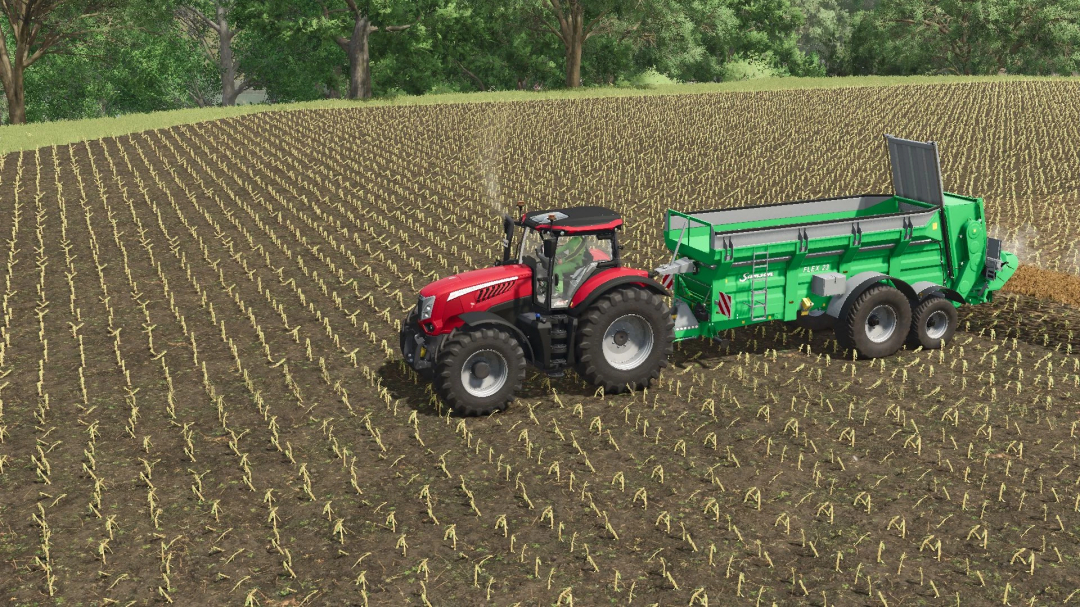 FS25 mod Samson Flex 23 v1.0.0.0 showcasing a red tractor towing a green manure spreader in a field.