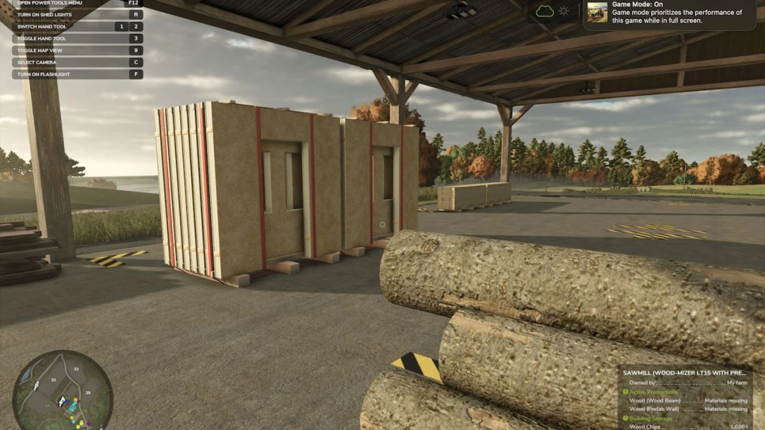 FS25 mods: Sawmill LT15 with PrefabWall in a rural setting, showcasing wood logs and prefab structures.