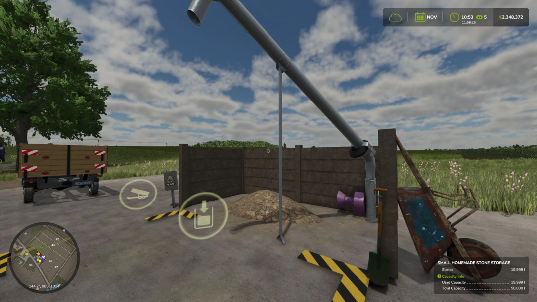 FS25 mod image showing Small Handmade Stone Silo in Farming Simulator 25 with stone pile and auger.