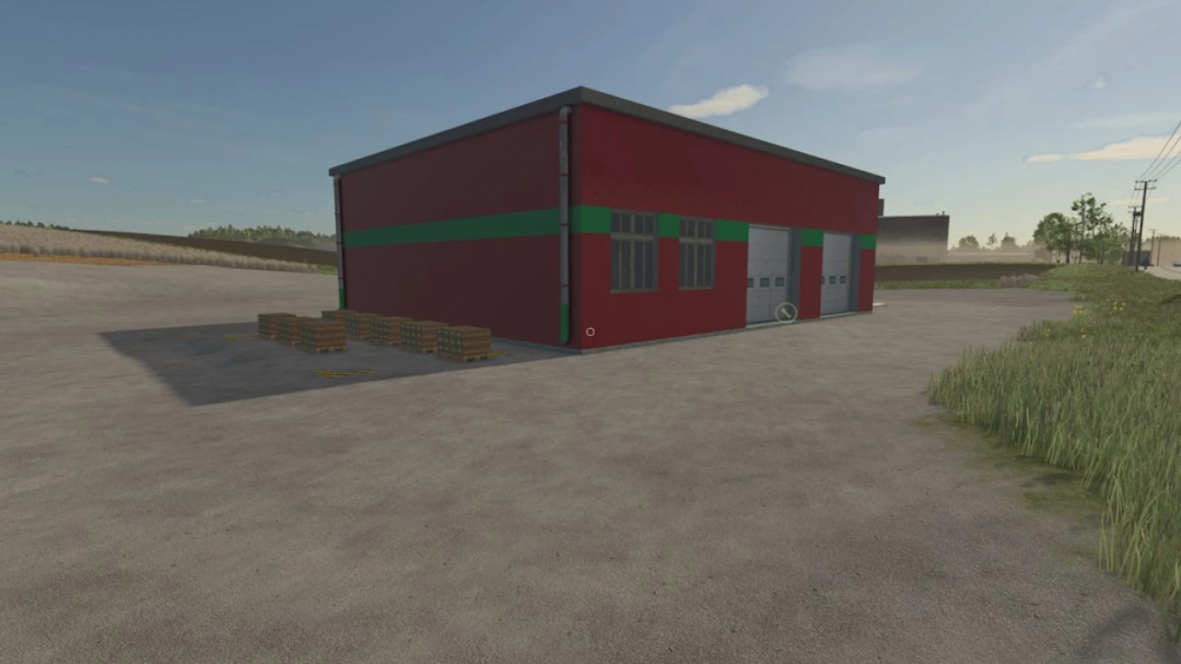 FS25 Soja Factory mod v1.0.0.0 showing a red building with pallets outside.