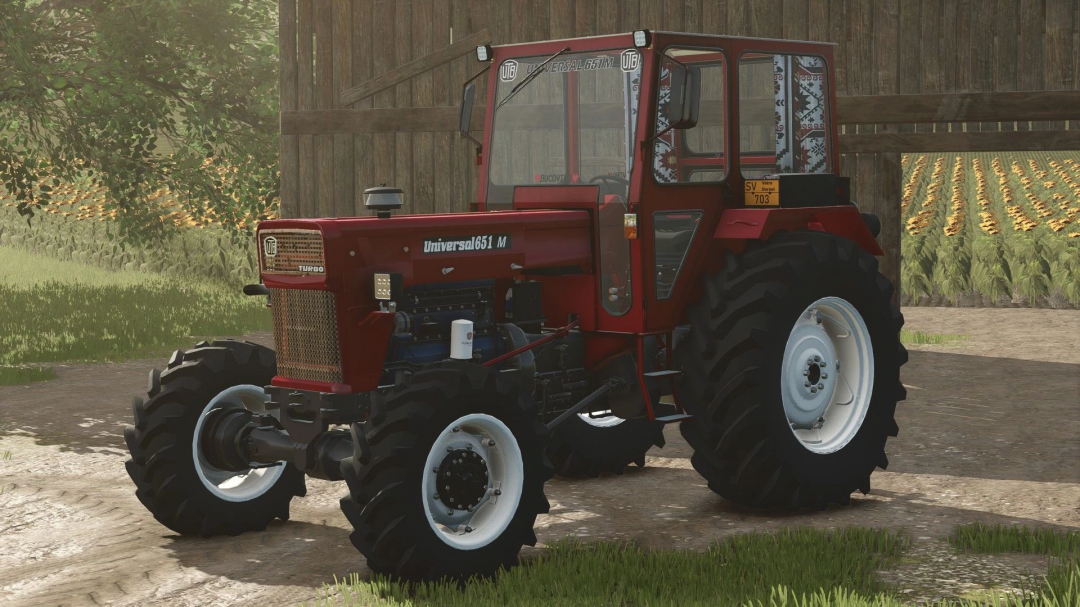 UTB 651 MDT v1.0.0.0 mod for FS25, showcasing a red tractor parked on a farm.