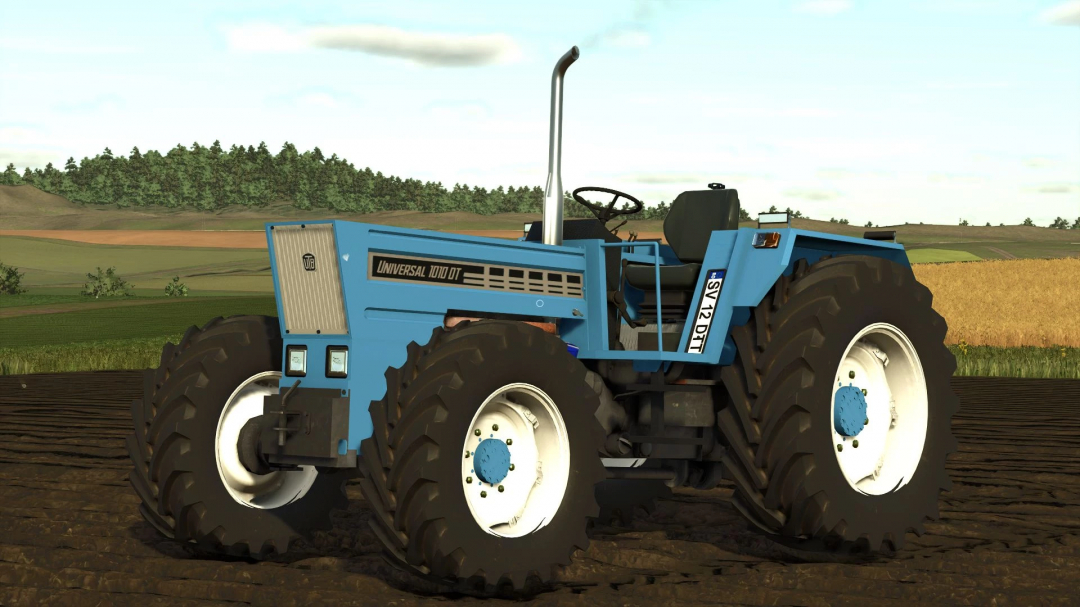 Universal 1010DT tractor mod in FS25, featuring a blue design, on a farm landscape.